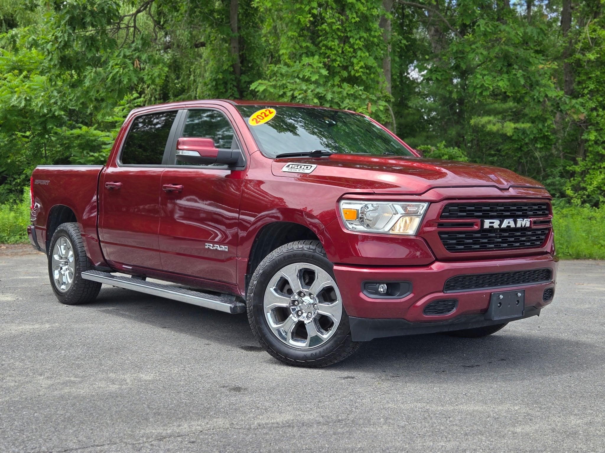2022 RAM 1500 Big Horn Crew Cab 4x4 5'7" Box in Red — front three-quarter view