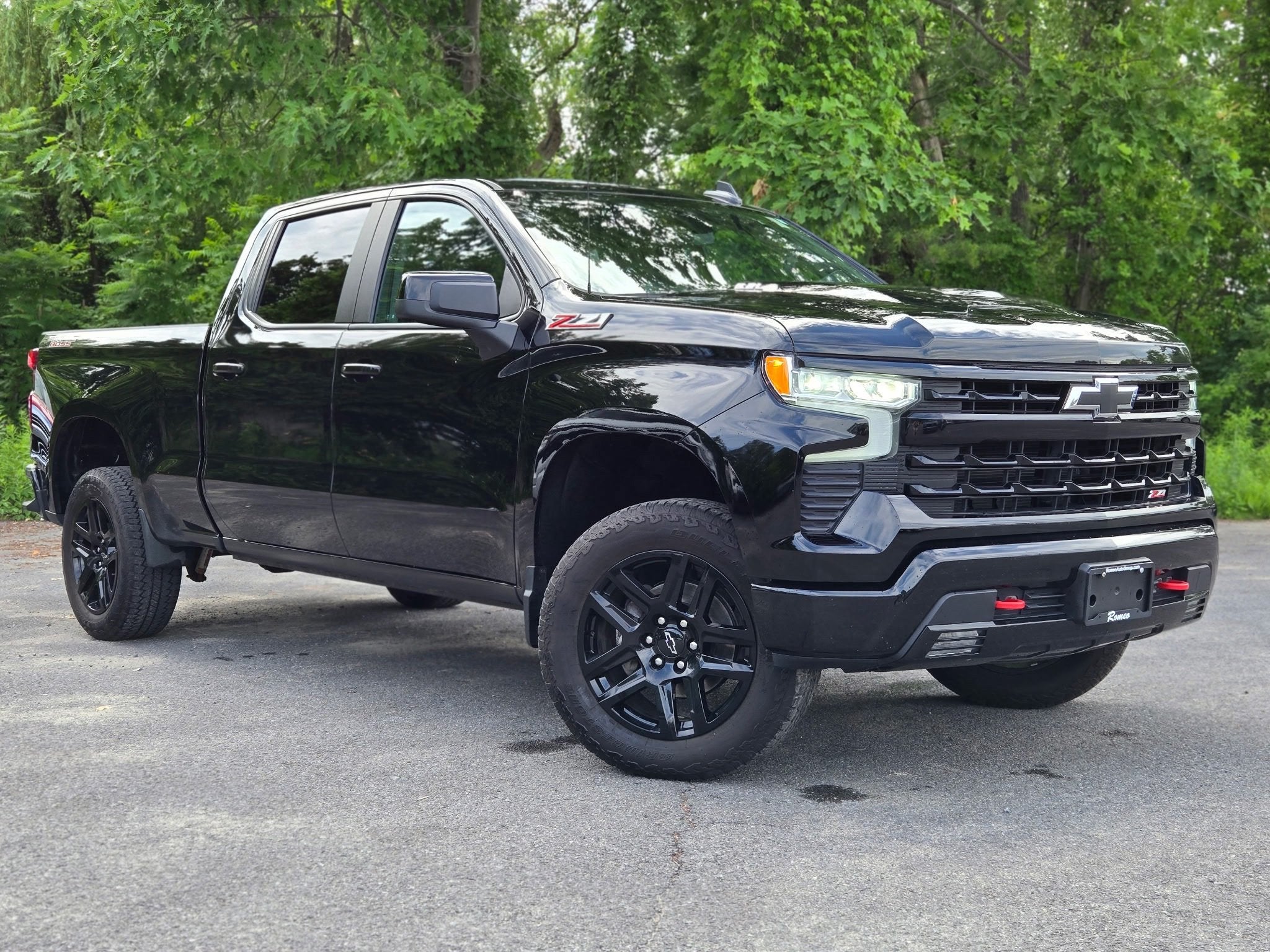 2024 Chevrolet Silverado 1500 LT Trail Boss in Black — front three-quarter view